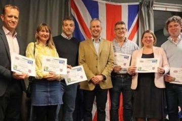 A group of people with certificates