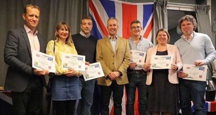 A group of people with certificates