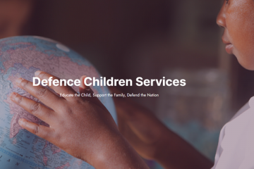 Defence Children Services. Image shows a child touching a globe