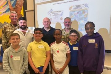 Military school children who have created an online book to help pupils understand the Armed Forces Covenant
